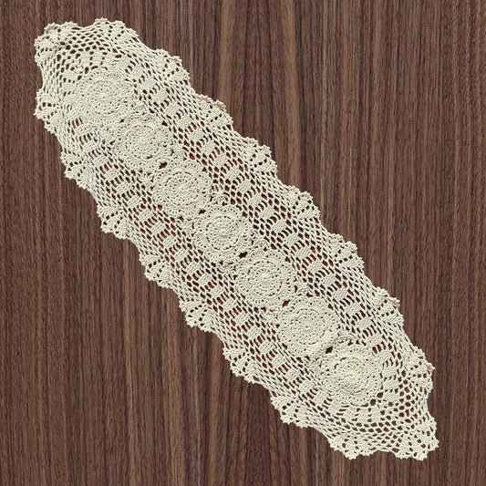 12x35 inch Crocheted table runner on a wooden surface